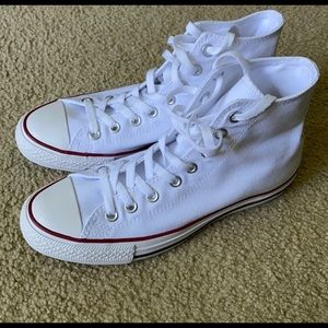 Women’s 9. White high top converse.